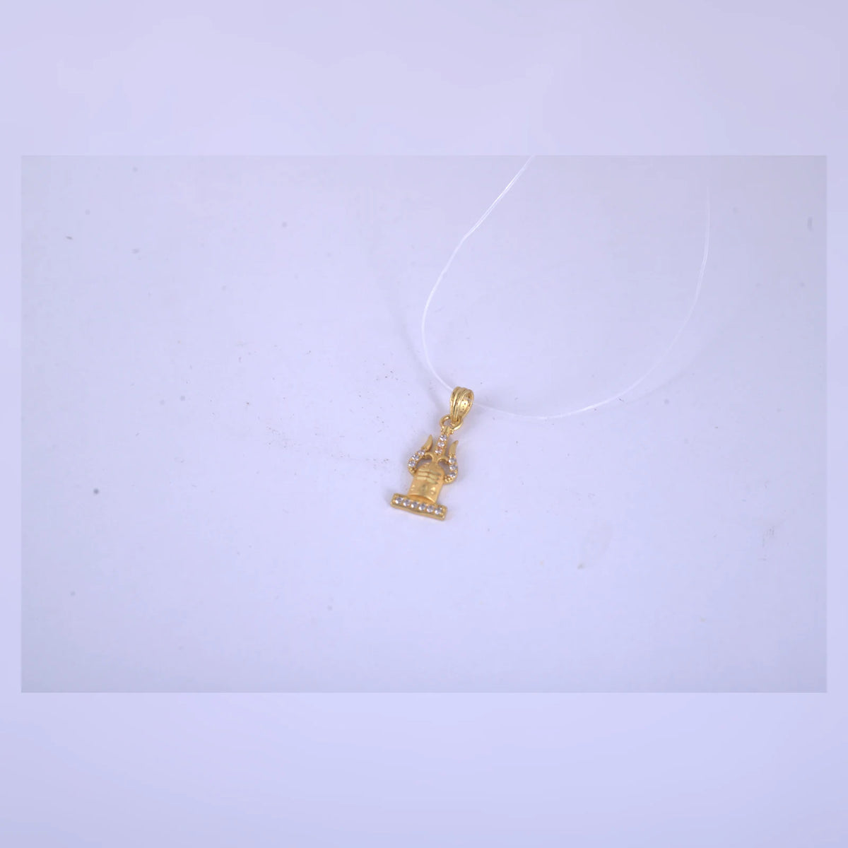 Gold-Tone Charm Pendant Necklace — A view