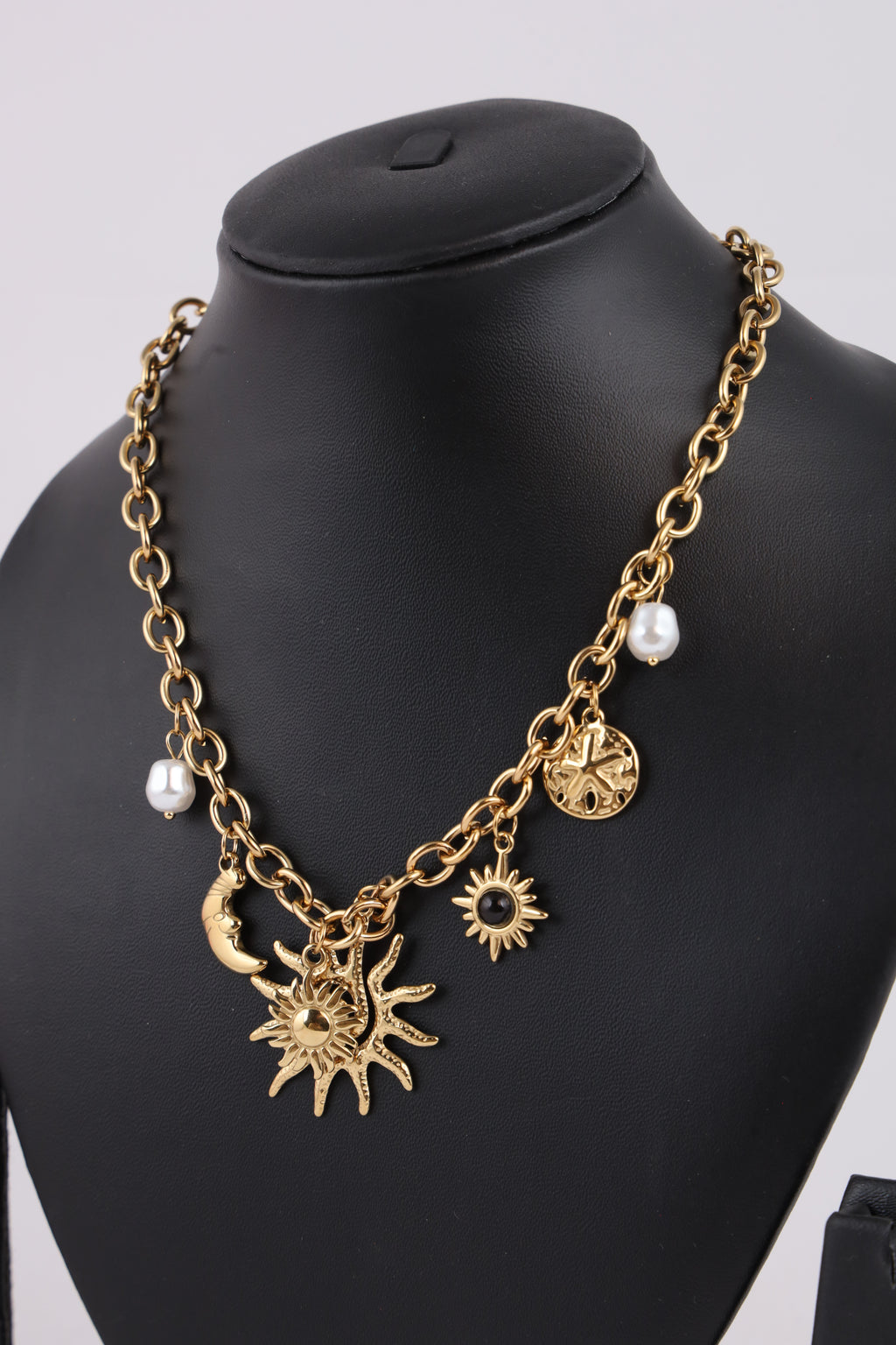 Golden Celestial Charm Necklace with Sun & Moon