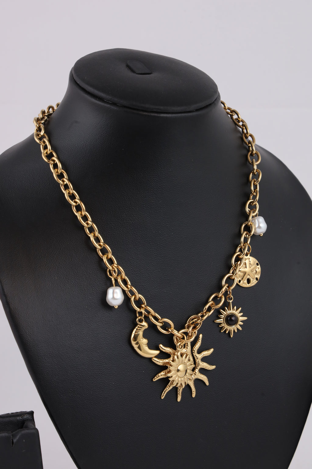 Golden Celestial Charm Necklace with Sun & Moon