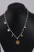 Pearl Necklace with Golden Heart Sunburst Pendant