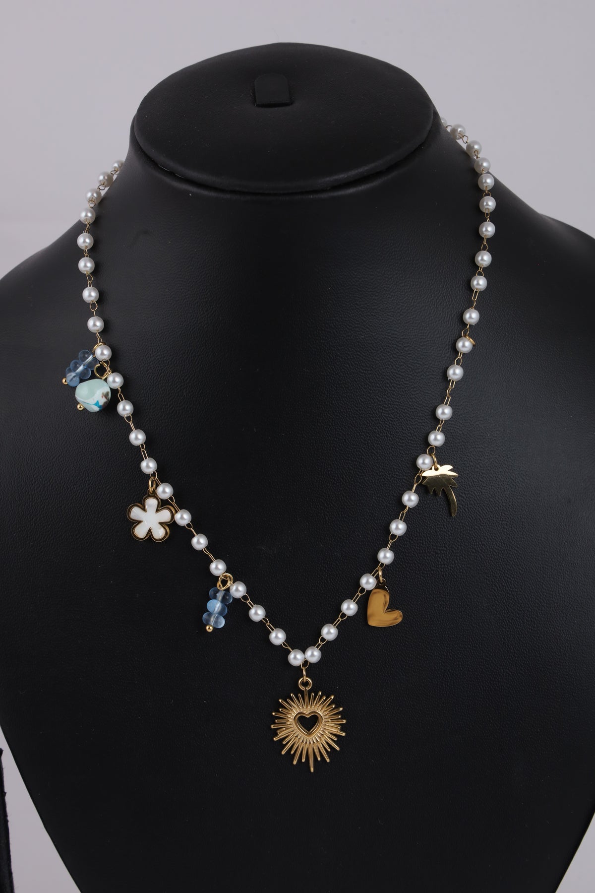 Pearl Necklace with Golden Heart Sunburst Pendant