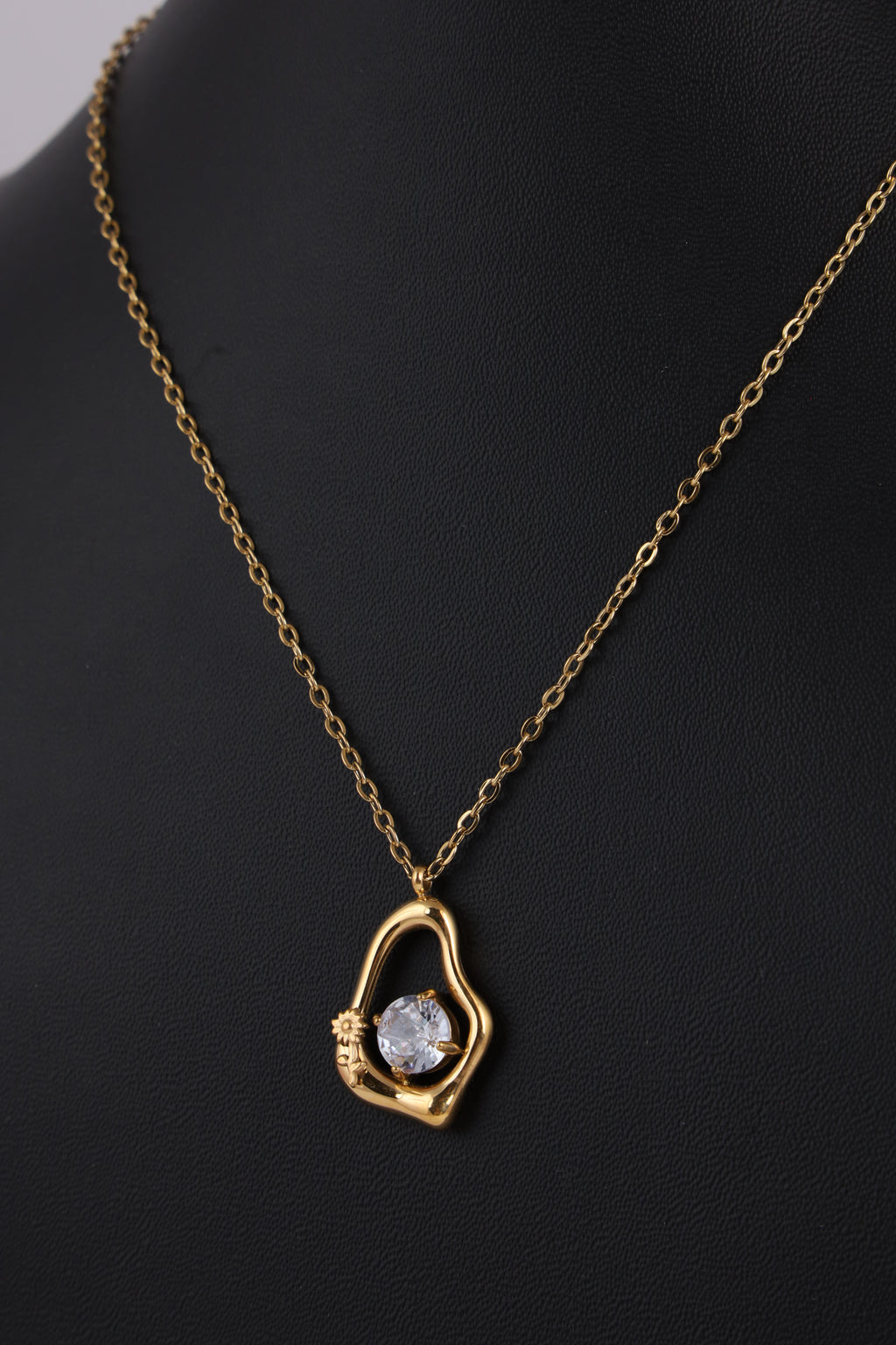 Gold-Tone Sculptural Pendant Necklace with Crystal Accent