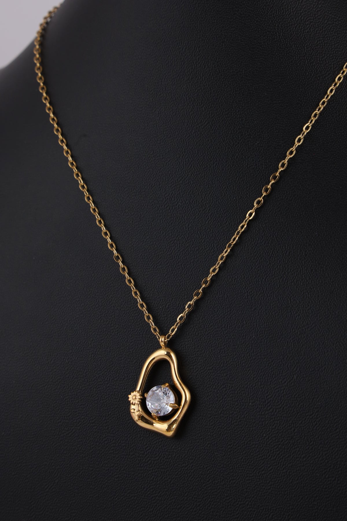 Gold-Tone Sculptural Pendant Necklace with Crystal Accent