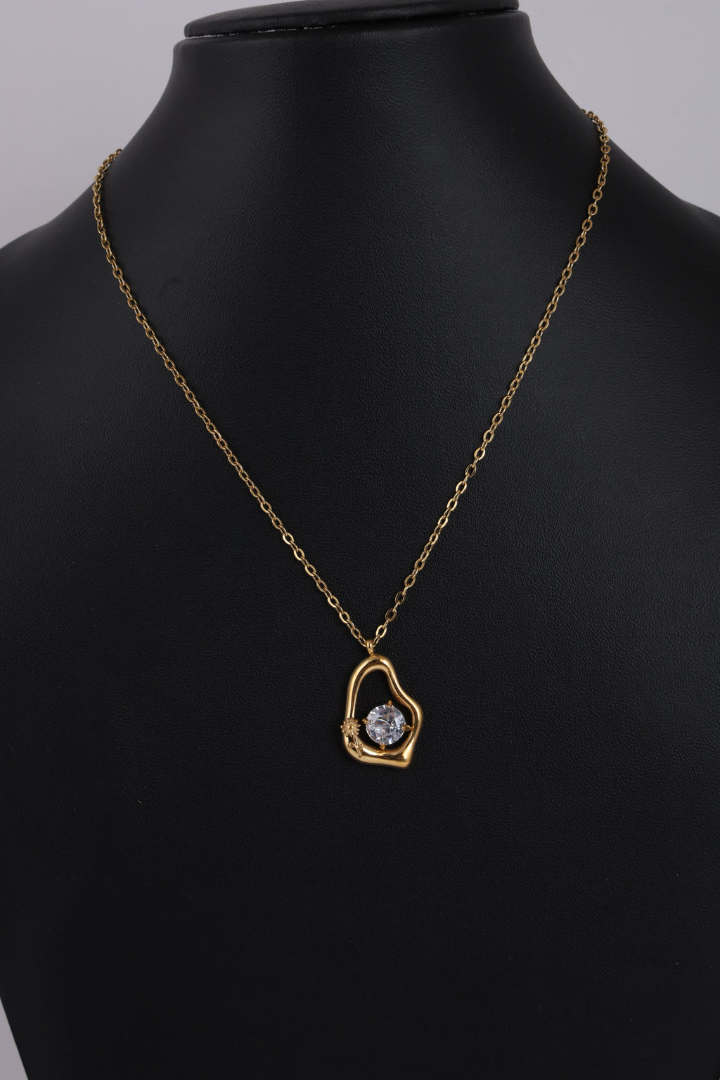 Gold-Tone Sculptural Pendant Necklace with Crystal Accent