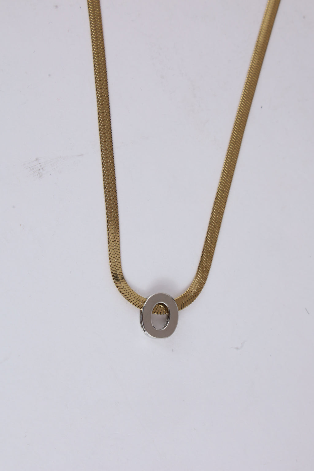 Gold-Tone Herringbone Chain Necklace with Oval Pendant