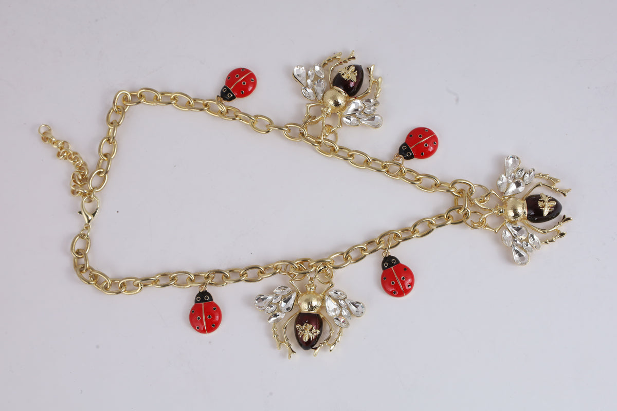 Ladybug Charm Necklace with Floral Details