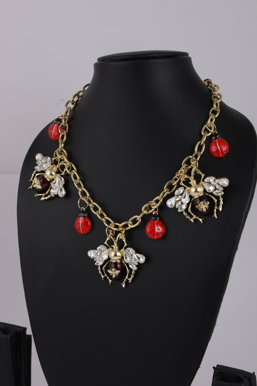 Ladybug Charm Necklace with Floral Details