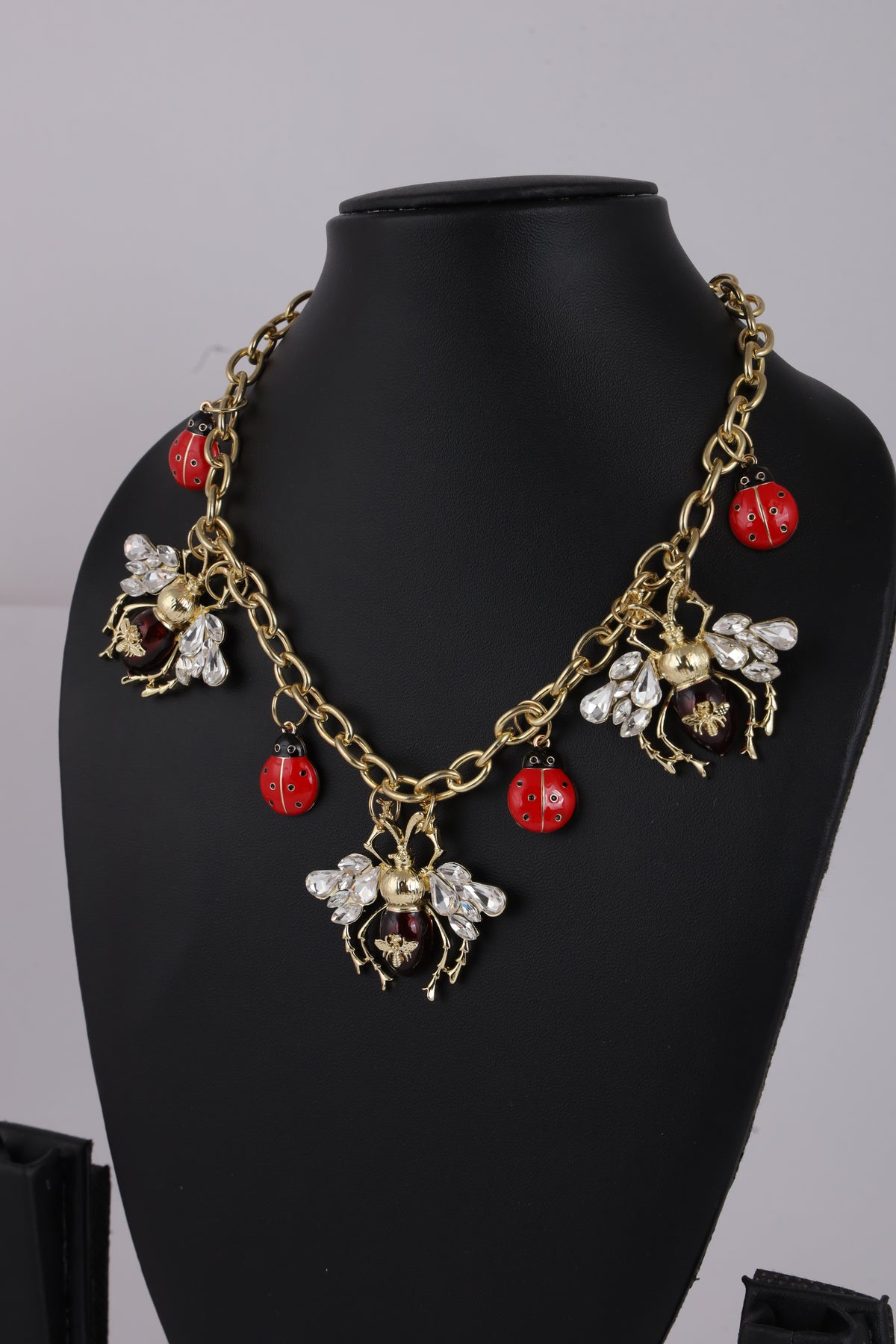 Ladybug Charm Necklace with Floral Details