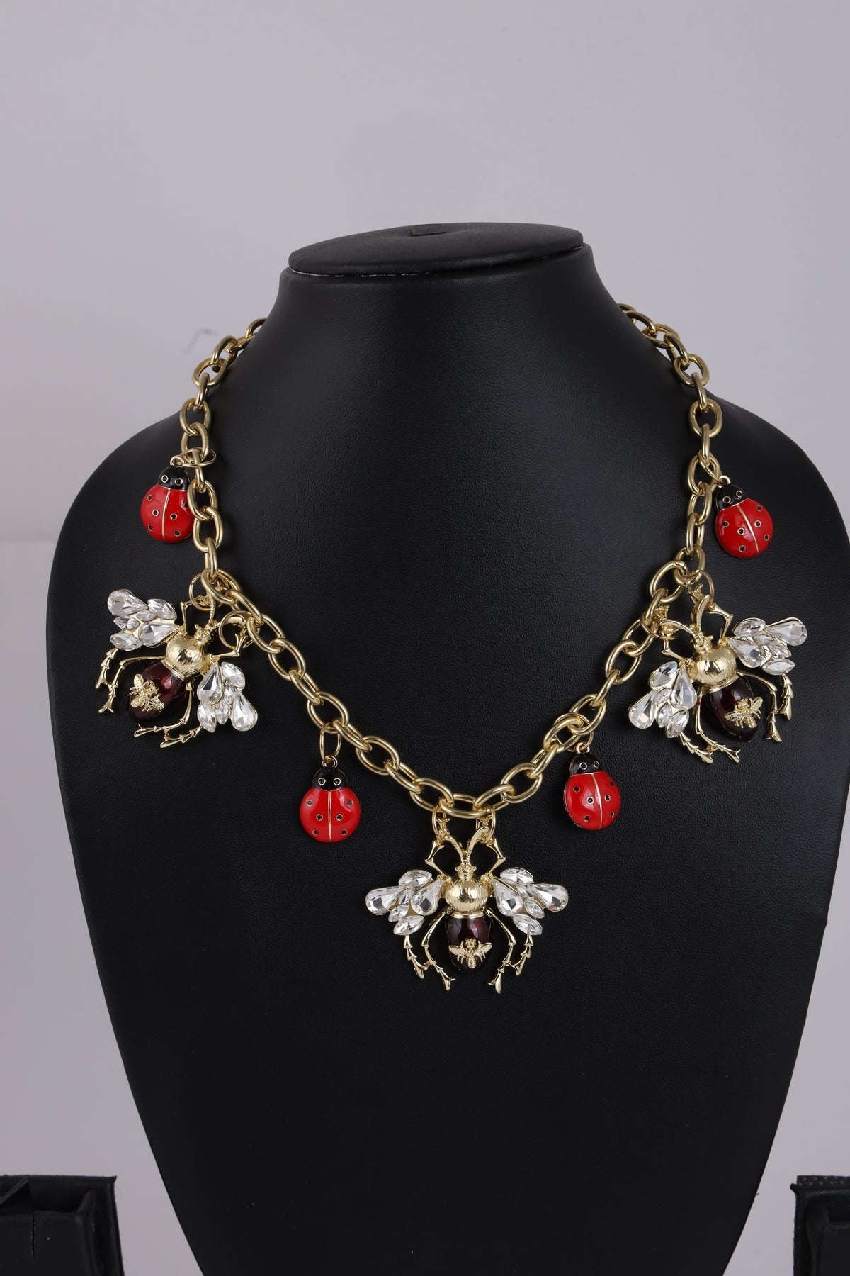 Ladybug Charm Necklace with Floral Details