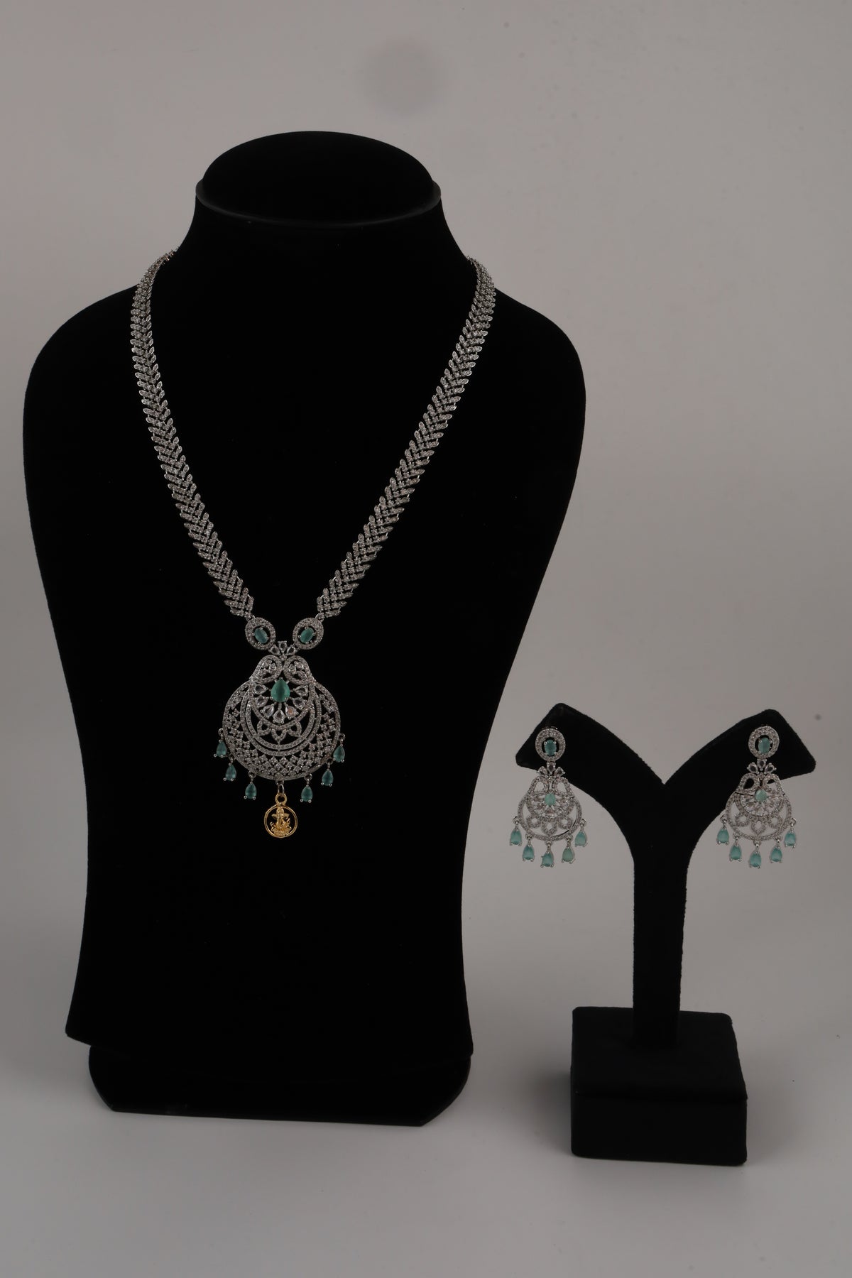 Silver-Tone Statement Necklace Set with Green Accents & Matching Earrings