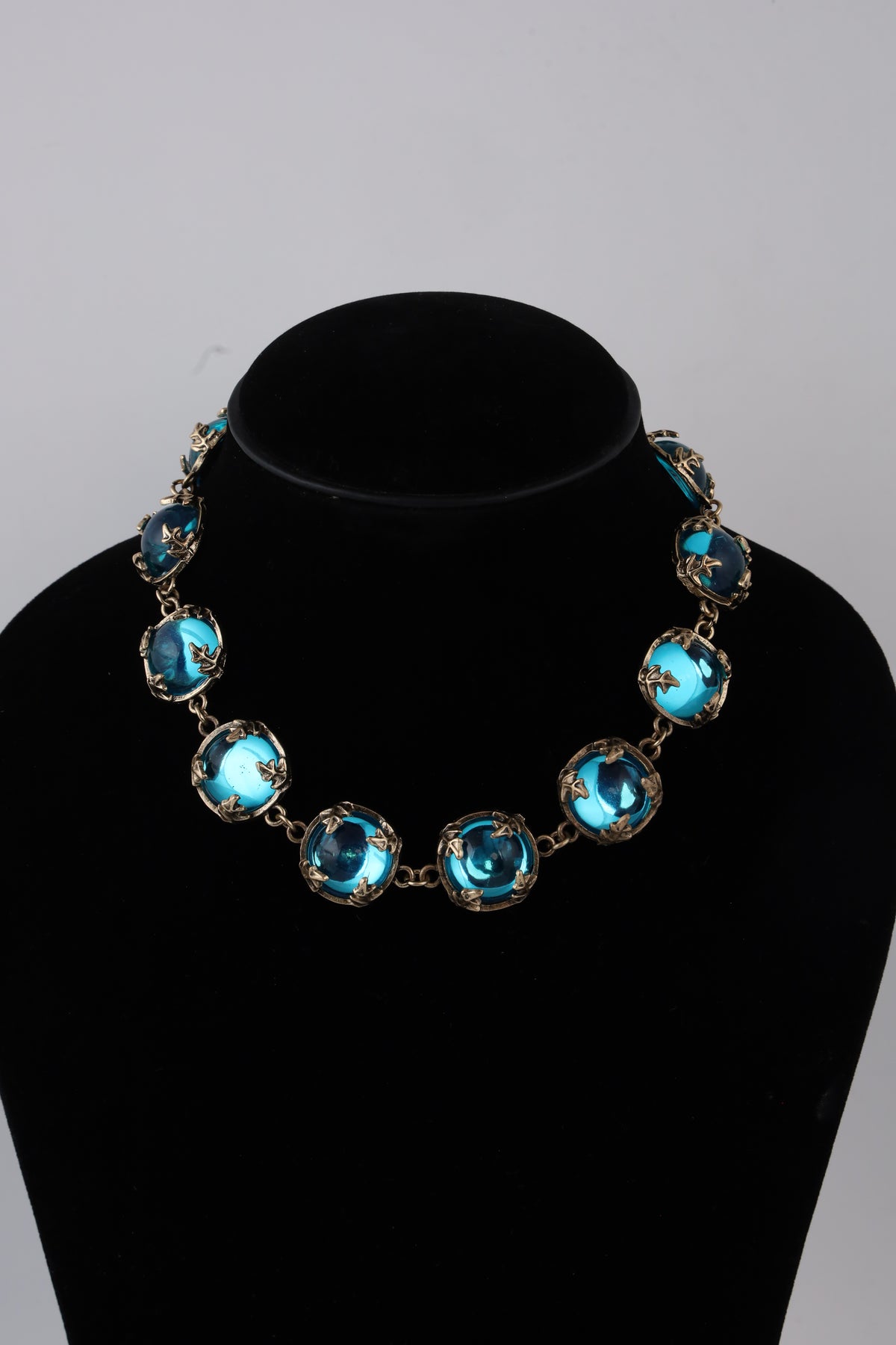 Gold-Tone Turquoise Statement Necklace with Artistic Stone Detailing