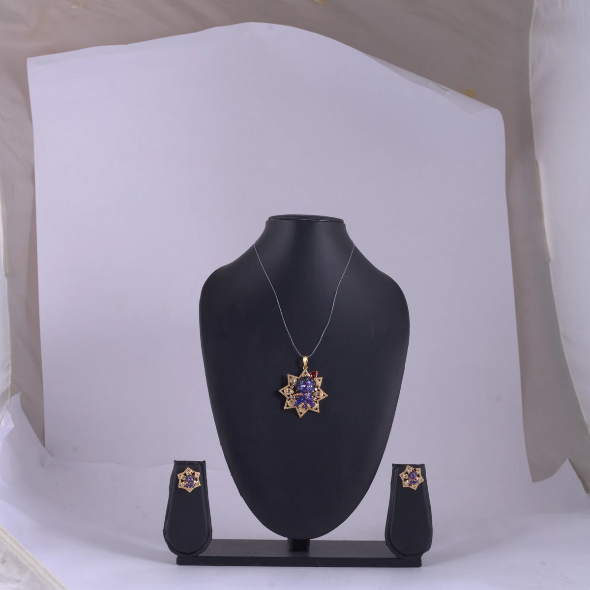 Blue Figurine Star Pendant Necklace — view A