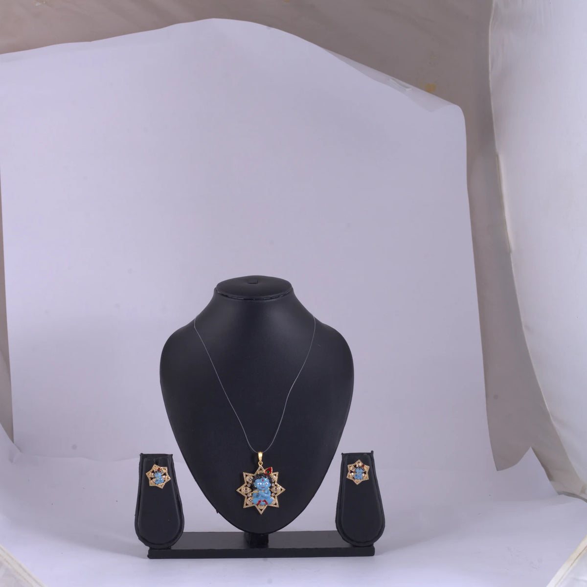 Blue Figurine Star Pendant Necklace — view A