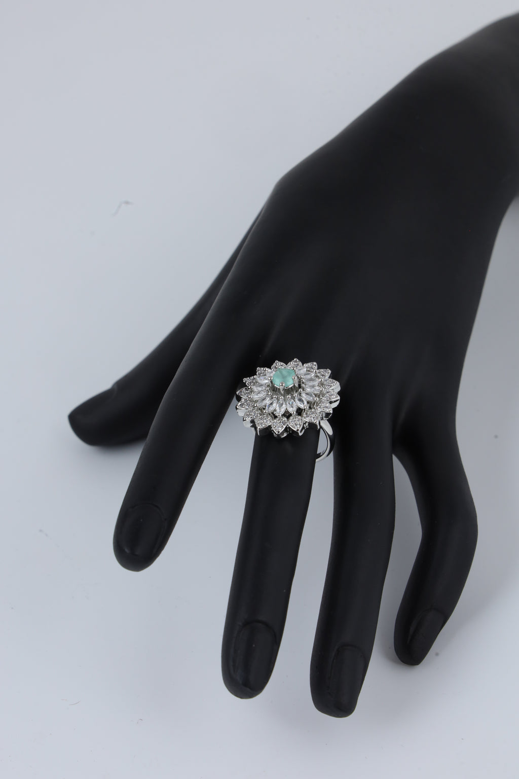 Silver Tone Floral Ring with Green Centre Stone