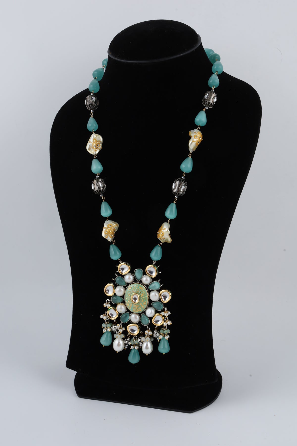 Turquoise Long Necklace with Ornate Floral Pendant