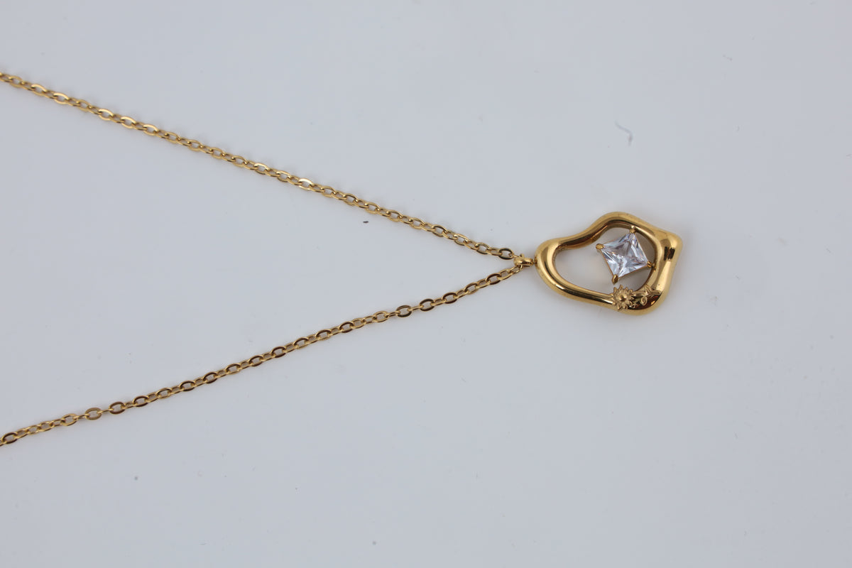 Geometric Gold Tone Pendant Necklace