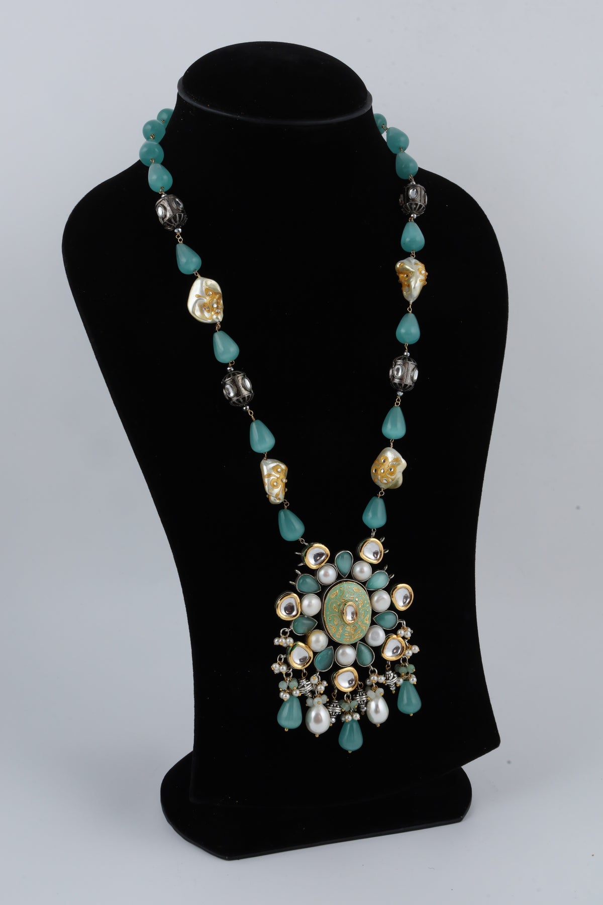 Turquoise Long Necklace with Ornate Floral Pendant