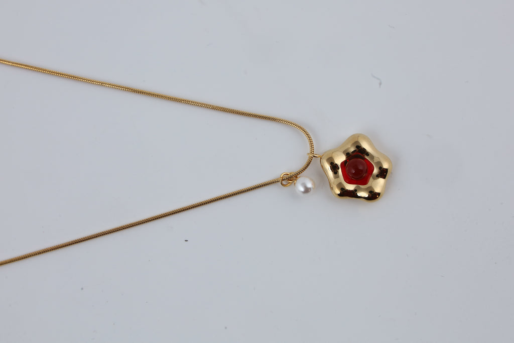 Red Stone Gold Tone Pendant Necklace