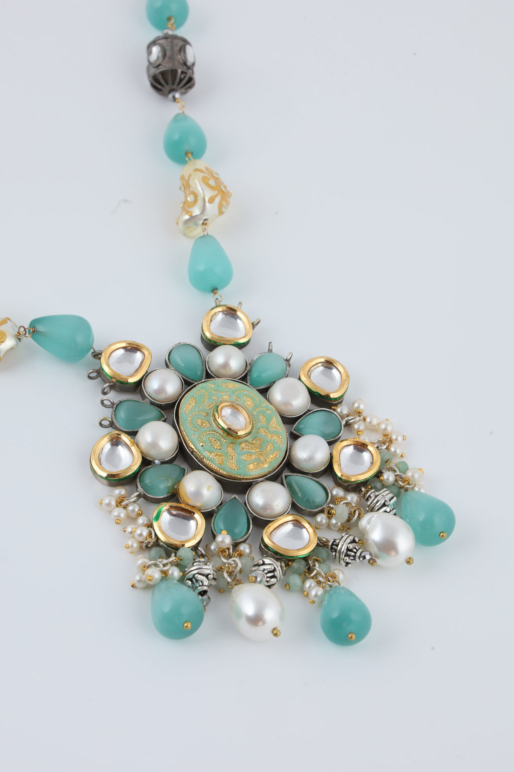 Turquoise Long Necklace with Ornate Floral Pendant