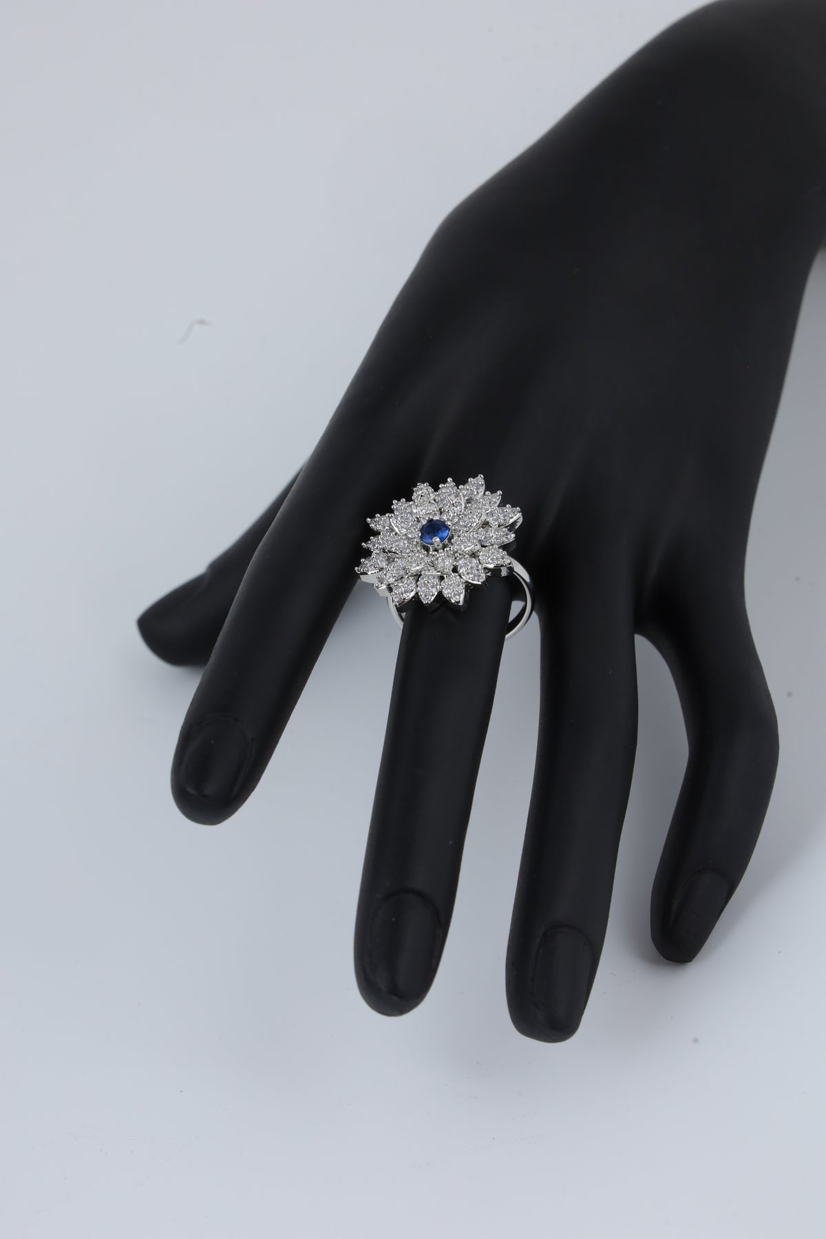 Silver Tone Floral Ring with Blue Centre Stone