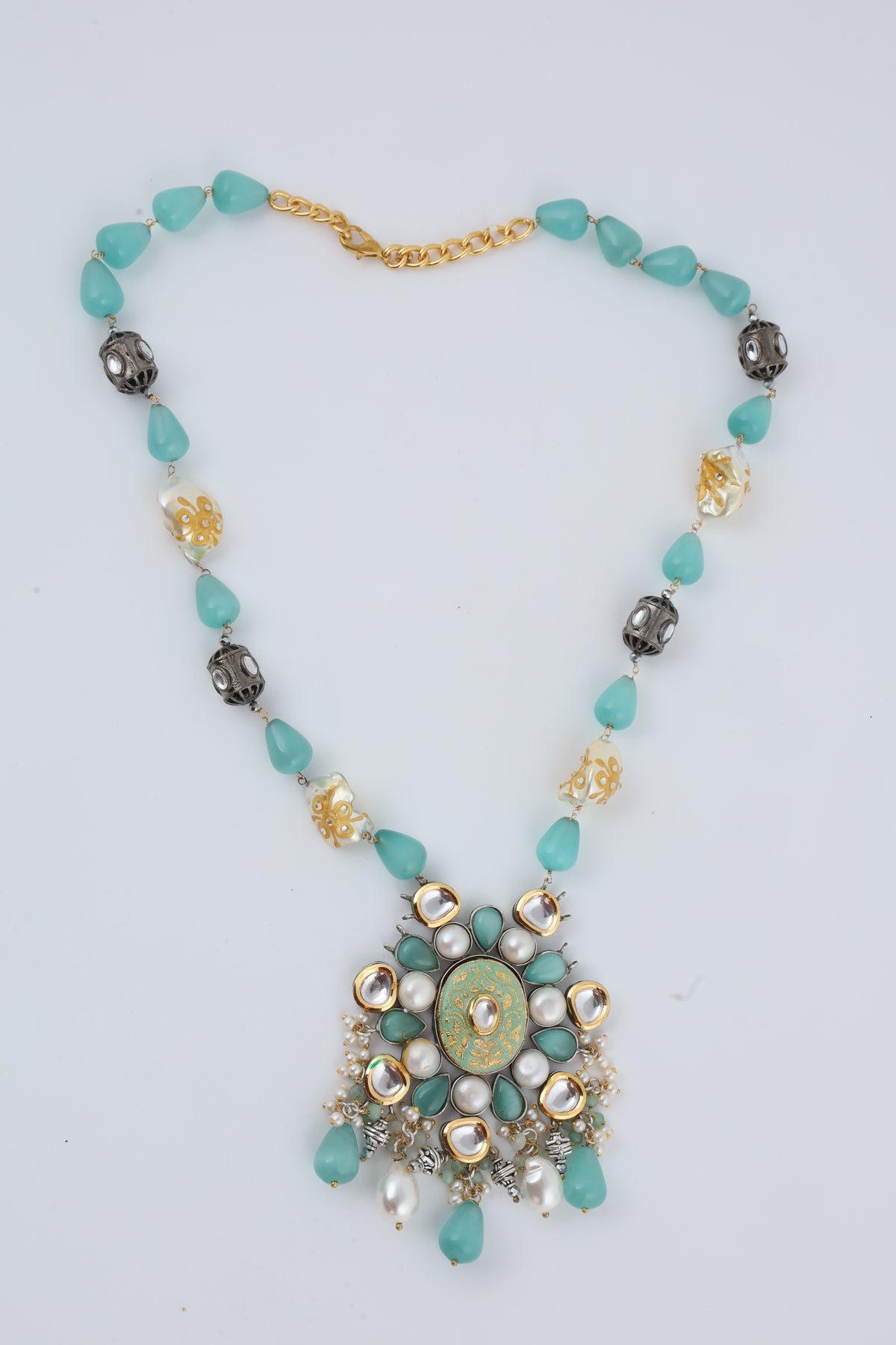 Turquoise Long Necklace with Ornate Floral Pendant