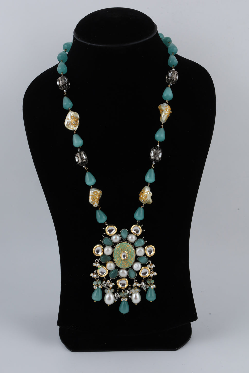 Turquoise Long Necklace with Ornate Floral Pendant