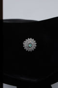 Silver Tone Floral Ring with Green Centre Stone