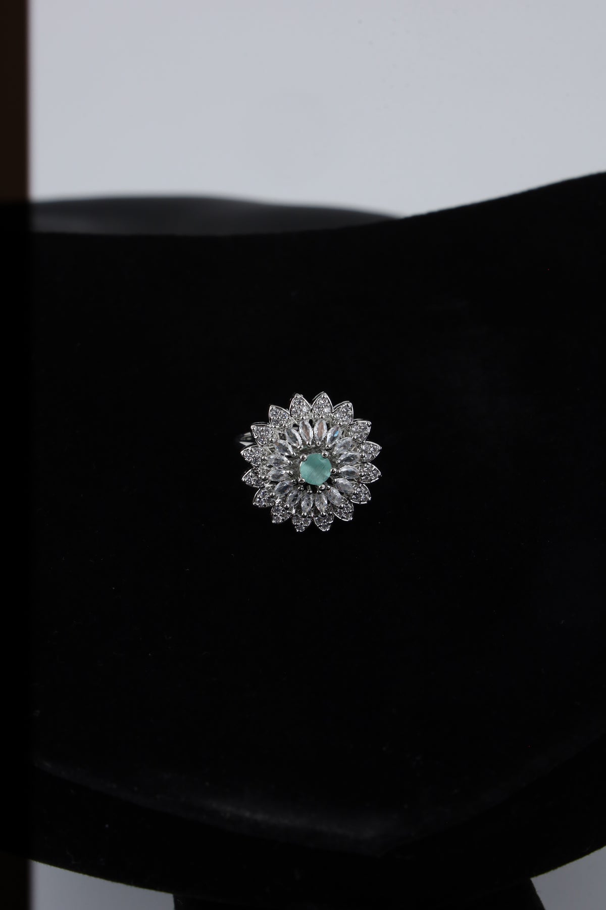 Silver Tone Floral Ring with Green Centre Stone
