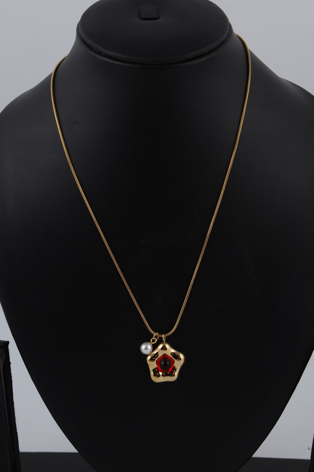 Red Stone Gold Tone Pendant Necklace