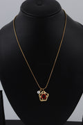 Red Stone Gold Tone Pendant Necklace