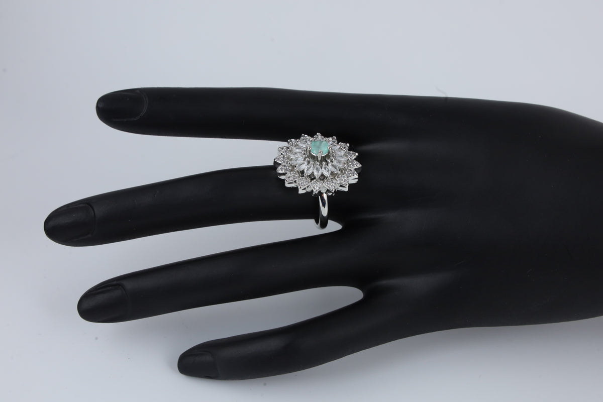 Silver Tone Floral Ring with Green Centre Stone